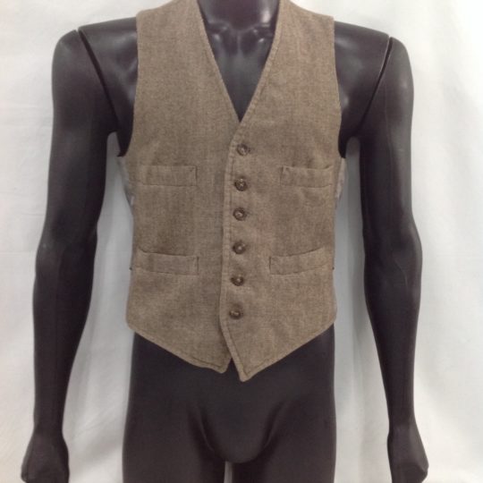 Men's waistcoat for hire. This brown pinstripe men's vest has 5 buttons on the front.  Wear this vest with any gangster suit, dress up a regular suit and add a cravat for a Titanic look. Also perfect with a cap and braces for a Peaky Blinders look.