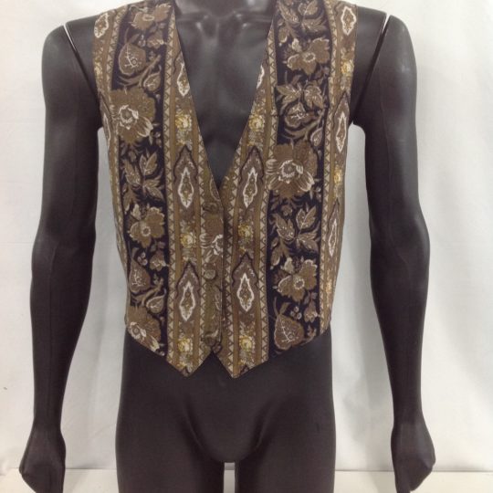 Men's waistcoat for hire. This men's vest with a gold pattern through it has 5 buttons on the front.  Wear this vest with any gangster suit, dress up a regular suit and add a cravat for a Titanic look. Also perfect with a cap and braces for a Peaky Blinders look.