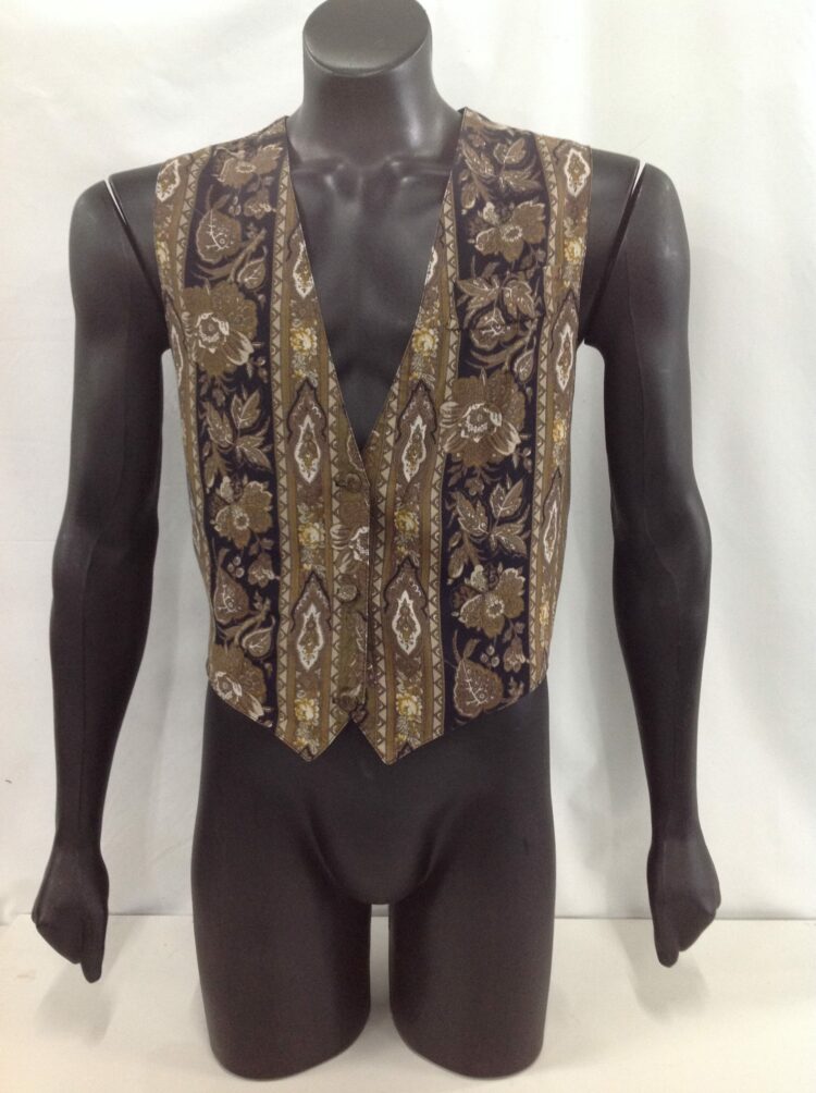 Men's waistcoat for hire. This men's vest with a gold pattern through it has 5 buttons on the front.  Wear this vest with any gangster suit, dress up a regular suit and add a cravat for a Titanic look. Also perfect with a cap and braces for a Peaky Blinders look.